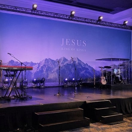 Customized stage scrims for houses of worship