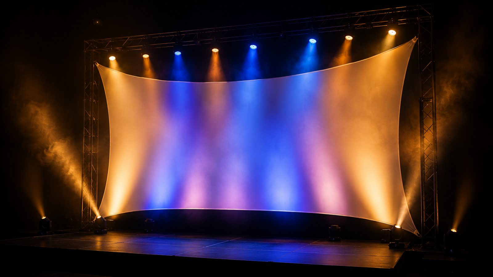 Flame-retardant poly stretch knit scrim stretched into a curved sculptural stage form lit in color