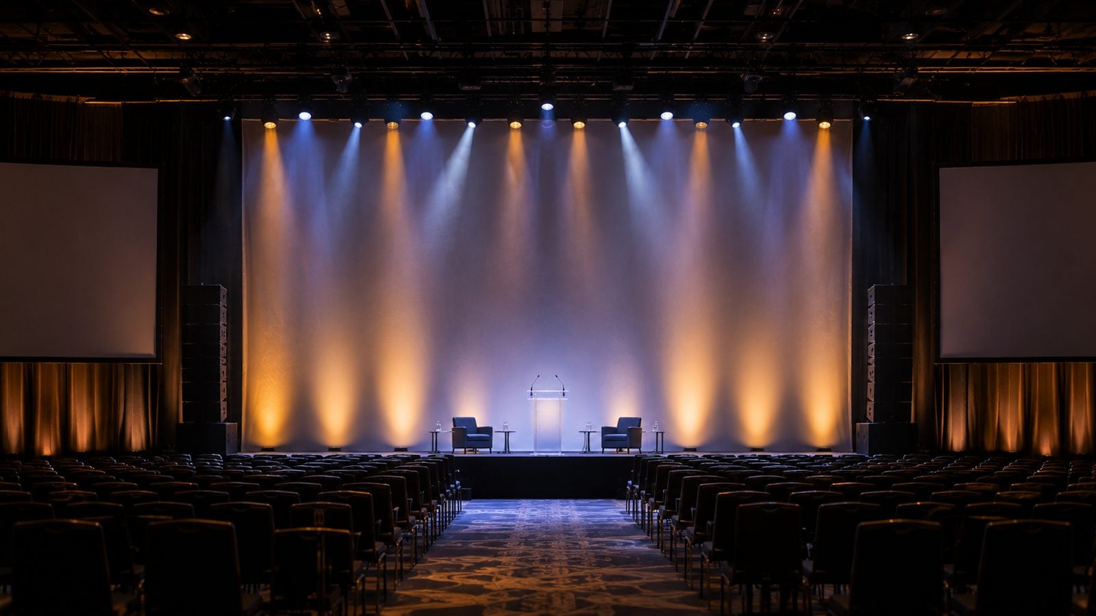Seamless projection scrim and stretch stage set at a corporate general session